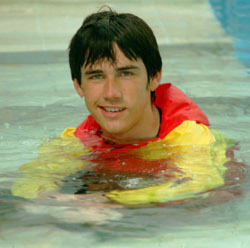 lifeguard in the water with clothes